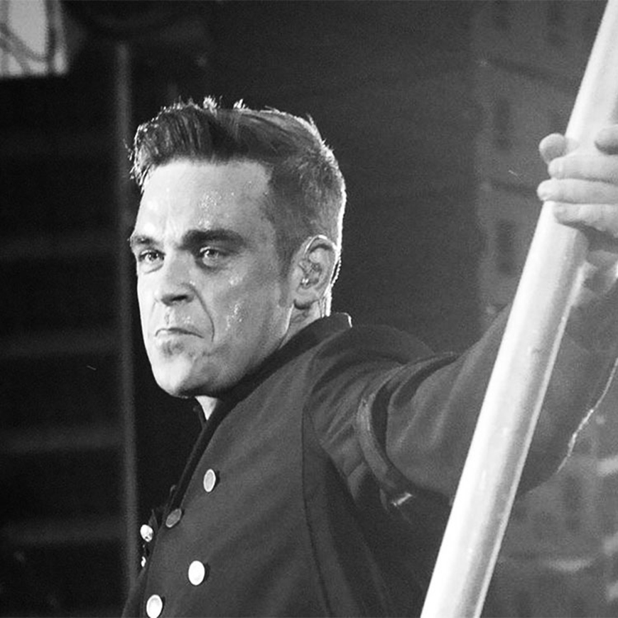 content marketing image of Robbie williams